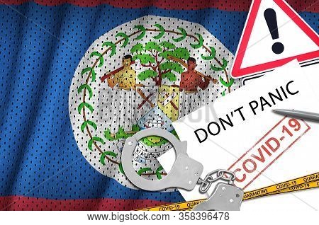 Belize Flag And Police Handcuffs With Inscription Dont Panic On White Paper. Coronavirus Or 2019-nco