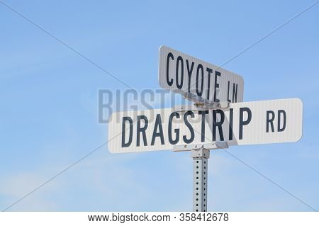 Dragstrip Rd Sign And Coyote Ln Sign In Goodyear, Maricopa County, Arizona Usa