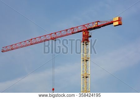 Tower Cranes Working On The Construction Of The Building