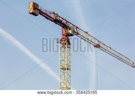 Tower Cranes Working On The Construction Of The Building