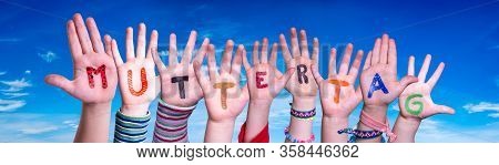 Children Hands Building Word Muttertag Means Mother Day, Blue Sky