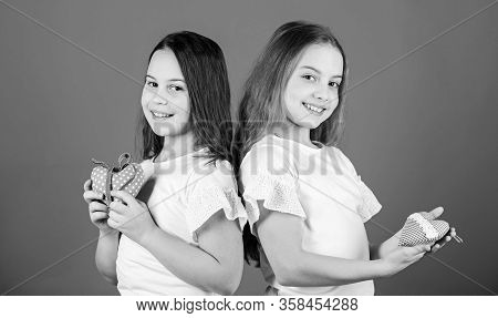 Warm Hearted. Little Children Holding Little Heart Gifts. Small Girls With Heart Shaped Decorations.