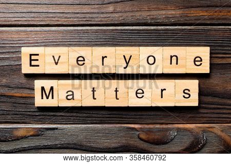 Everyone Matters Word Written On Wood Block. Ever Yone Matterstext On Wooden Table For Your Desing, 