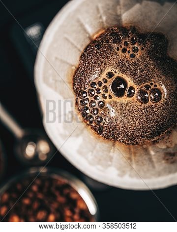 The Process Of Making Coffee By The Alternative Method Of Purover, Paper Filter, Top View, Dark Back