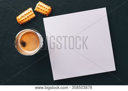 One Portion Of Espresso In Glass Transparent Cups, Bisuits And White Square Paper Card For Text On A