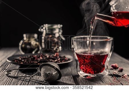 Process Brewing Red Karkade Tea, Rose Tea Ceremony, Cup Of Freshly Brewed Fruit Tea, Dark Moody.hot 