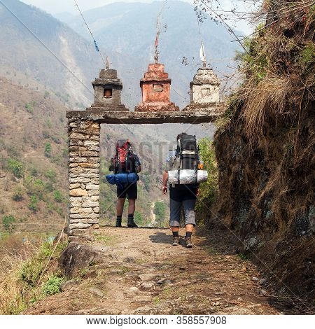 Entry To Round Annapurna Circuit Trekking Trail With Two Tourists, Nepal Himalayas Mountaints