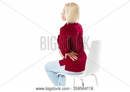 Woman Female Back Ache, Back Pain - Middle Age Woman Sitting On Chair And Massaging Back Pain