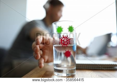 Hand Reaches For Glass Infected With Coronavirus. Acute Respiratory Infection With All Their Charact