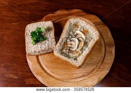 Mushroom Soup In A Bowl Of Bread