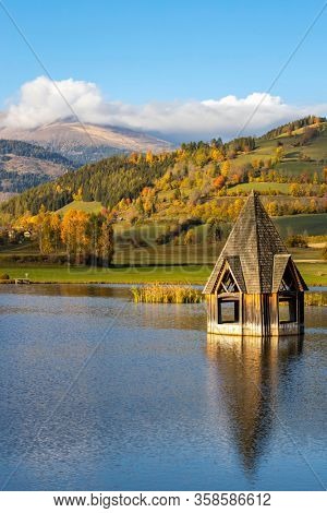 autumn pond under the mountains, Murau district,
Styria, Austria
