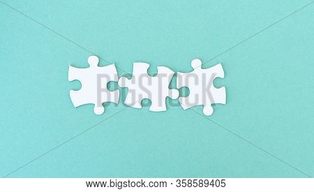 Jigsaw puzzle pieces in a row for inscription, 3 pieces