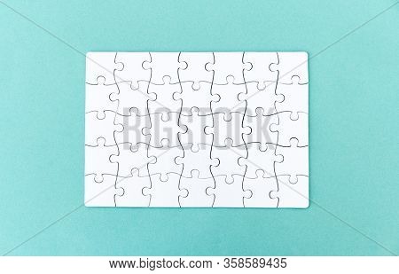 Top view of completed blank rectangular puzzle