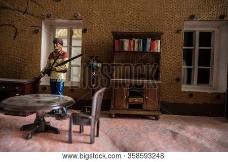 A Realistic Dollhouse Living Room With Furniture And Window At Night. Artwork Table Decoration With