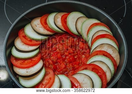 Vegetables Prepared For Making Ratatouille In Frying On Stove