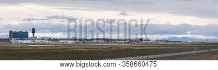 Richmond, Bc, Canada - Mar 29, 2020: Air Canada Aircraft Parked On The Tarmac With Yvr Airport In Th