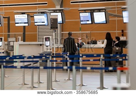 Richmond, Bc, Canada - Mar 29, 2020: Travellers In The International Departures Section Of Yvr Which