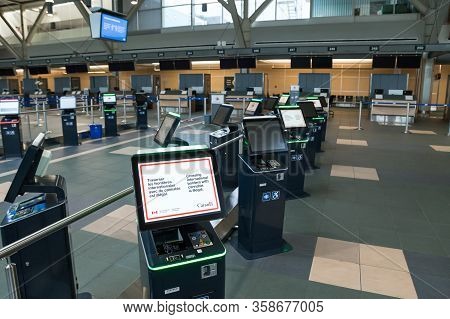 Richmond, Bc, Canada - Mar 29, 2020: International Departures Section Of Yvr Which Is Nearly Empty D