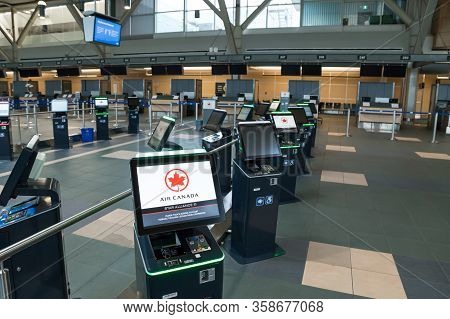 Richmond, Bc, Canada - Mar 29, 2020: International Departures Section Of Yvr Which Is Nearly Empty D