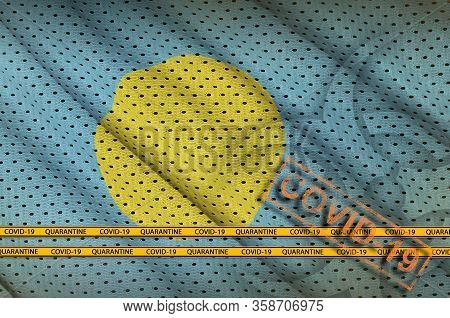 Palau Flag And Orange Covid-19 Stamp With Border Tape. Coronavirus Or 2019-ncov Virus Concept