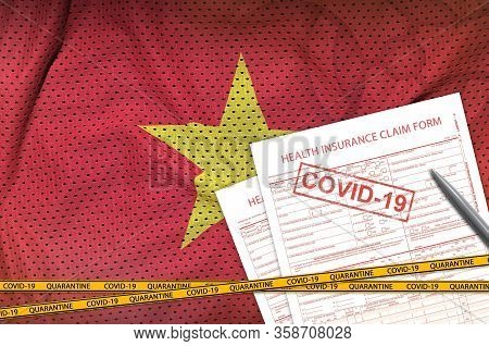 Vietnam Flag And Health Insurance Claim Form With Covid-19 Stamp. Coronavirus Or 2019-ncov Virus Con