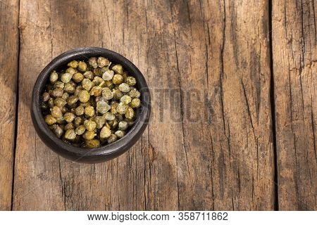 Capers In Wooden Bowl - Capparis Spinosa
