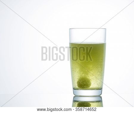 The Effervescent Tablet Dissolves In A Glass Of Water