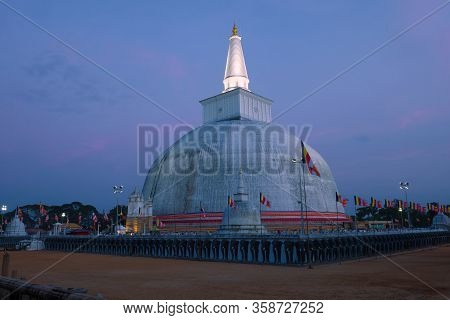 View Of The Ruwanweli Maha Seya Dagoba In The Evening Twilight. Anuradhapura, Sri Lanka