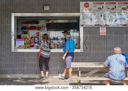 Magog, Quebec, Canada - September 8, 2018: Shoppers At A Diner By Lake Memphremagog, Quebec, Canada