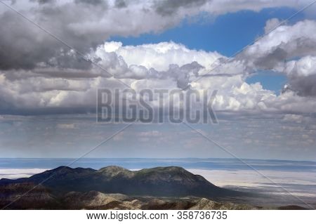 Rain, Storm And Dark Thunderous Clouds Approach From The East, Towards The Crest Of The Sandia Mount