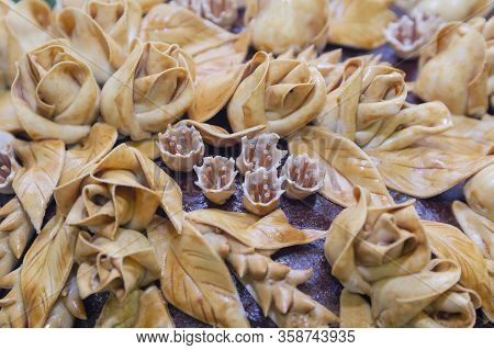 Fresh Loaf With Decoration In The Form Of Flowers Closeup. Food