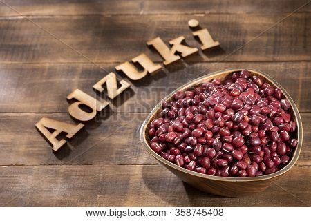 Red Bean Adzuki - Vigna Angularis. Word Adzuki In Wooden Letters
