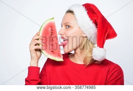Delicious Christmas Concept. Christmas Summer Destinations. Christmas Girl Eat Watermelon. Woman San