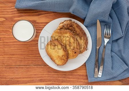 French Toast - Przenice - Slices Of Bread Soaked In Beaten Eggs And Milk And Fried, With A Glas Of Y