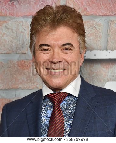 LOS ANGELES - FEB 20:  Art Bonilla {Object} arrives for Netflixâs âGentefiedâ Premiere on February 20, 2020 in Los Angeles, CA