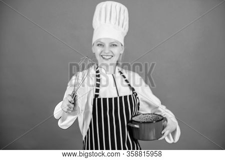 Girl In Apron Whipping Eggs Or Cream. Start Slowly Whisking Whipping Or Beating Cream. Use Hand Whis