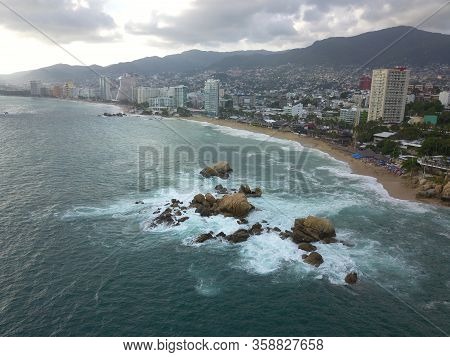 Aerial View Of Acapulco Bay At Sunset
