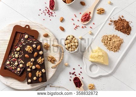 Raw Vegan Handmade Chocolate With Nuts And Dried Fruits. Chocolate Bars And Organic Ingredients: Coc