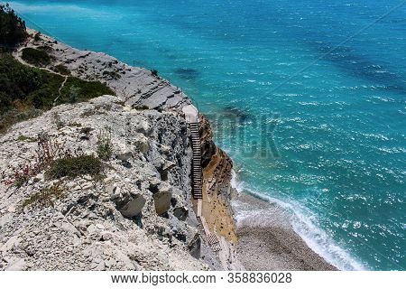 Sosnovka, a picturesque wild beach at the foot of the rocks in the vicinity of the resort of Gelendzhik. Black sea coast