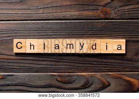 Chlamydia Word Written On Wood Block. Chlamydia Text On Table, Concept
