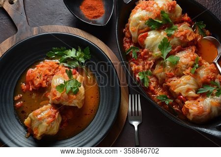 Cabbage Rolls Stuffed With Ground Beef And Rice In Tomato Sauce