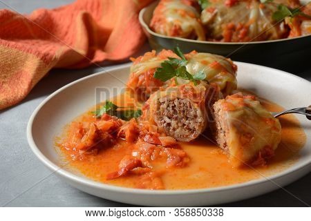 Cabbage Rolls Stuffed With Ground Beef And Rice In Tomato Sauce