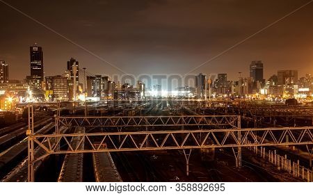 Night Time View Of Commuter Trains Under Nelson Mandela Bridge In Braamfontein Johannesburg Cbd
