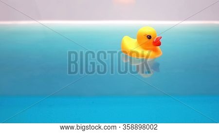 Yellow Rubber Duck Floating In Bath, Relaxing Time For Children, Macro Shot