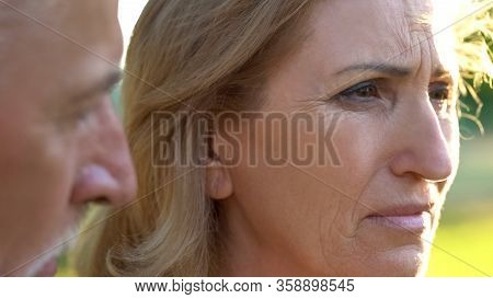Old Male Supporting His Upset Wife After Bad News About Incurable Disease