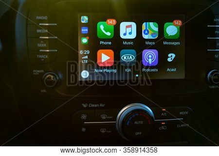 Phoenix, Az-USA 8.14.19: Apple CarPlay on screen of Kia Soul car dashboard. CarPlay is an Apple App that is controlled via iPhone.