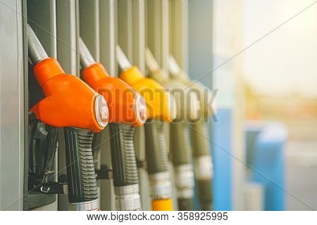 Gas Station. Gas Pump Nozzles On The Petrol Station.