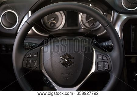 Russia, Izhevsk - March 05, 2020: Suzuki Showroom. Steering Wheel Of New Vitara Car. Famous World Br