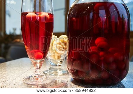 The Glass Jar Of Cherry Compote, A Glass With Compote, Sweets In A Vase, Close Up