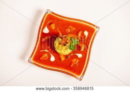 Seasoned Tomato Soup With Avocado And Decorations